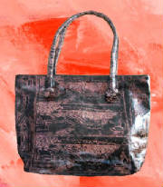 leatherhandbagbandwlandscape.jpg